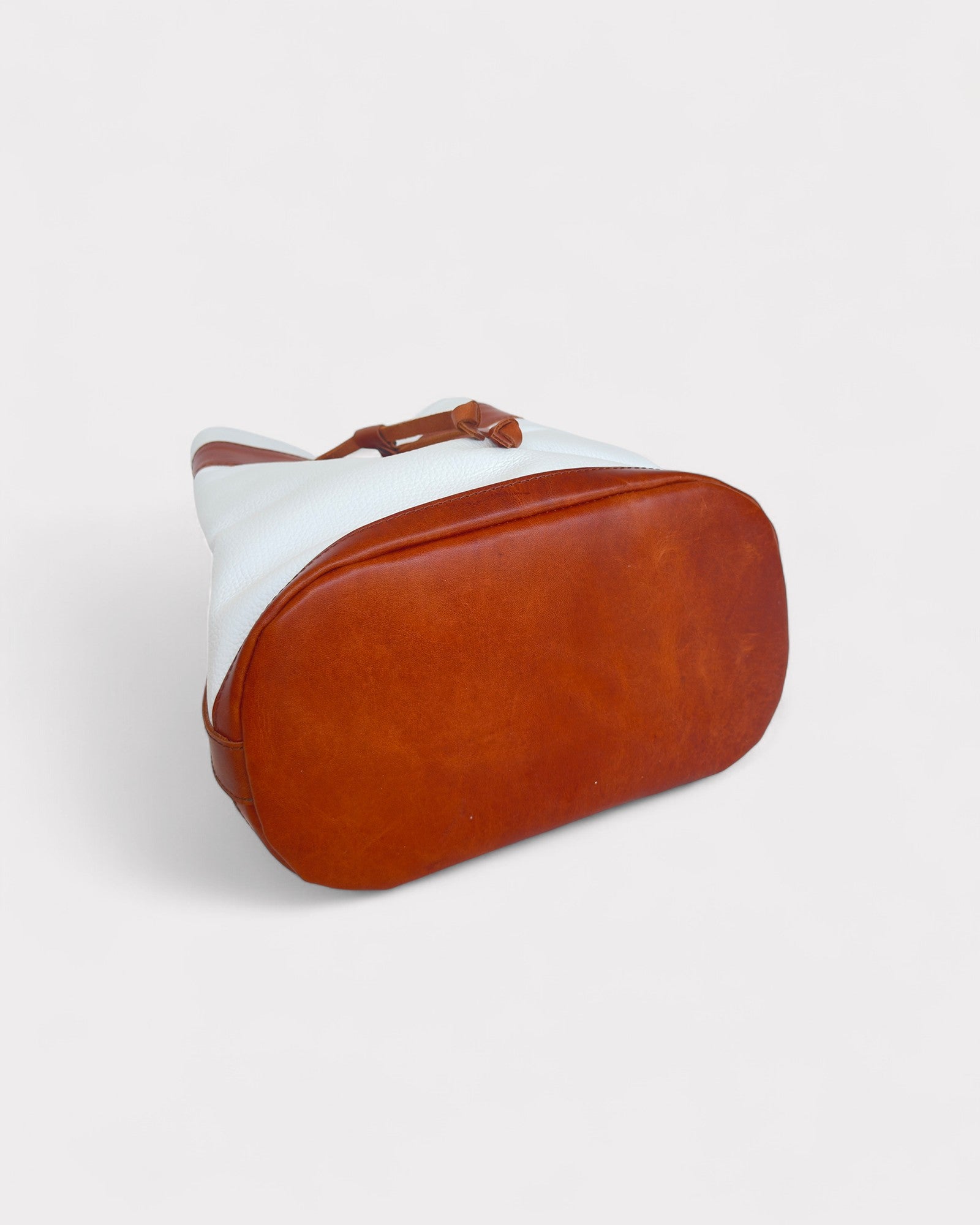 Brown and white bucket