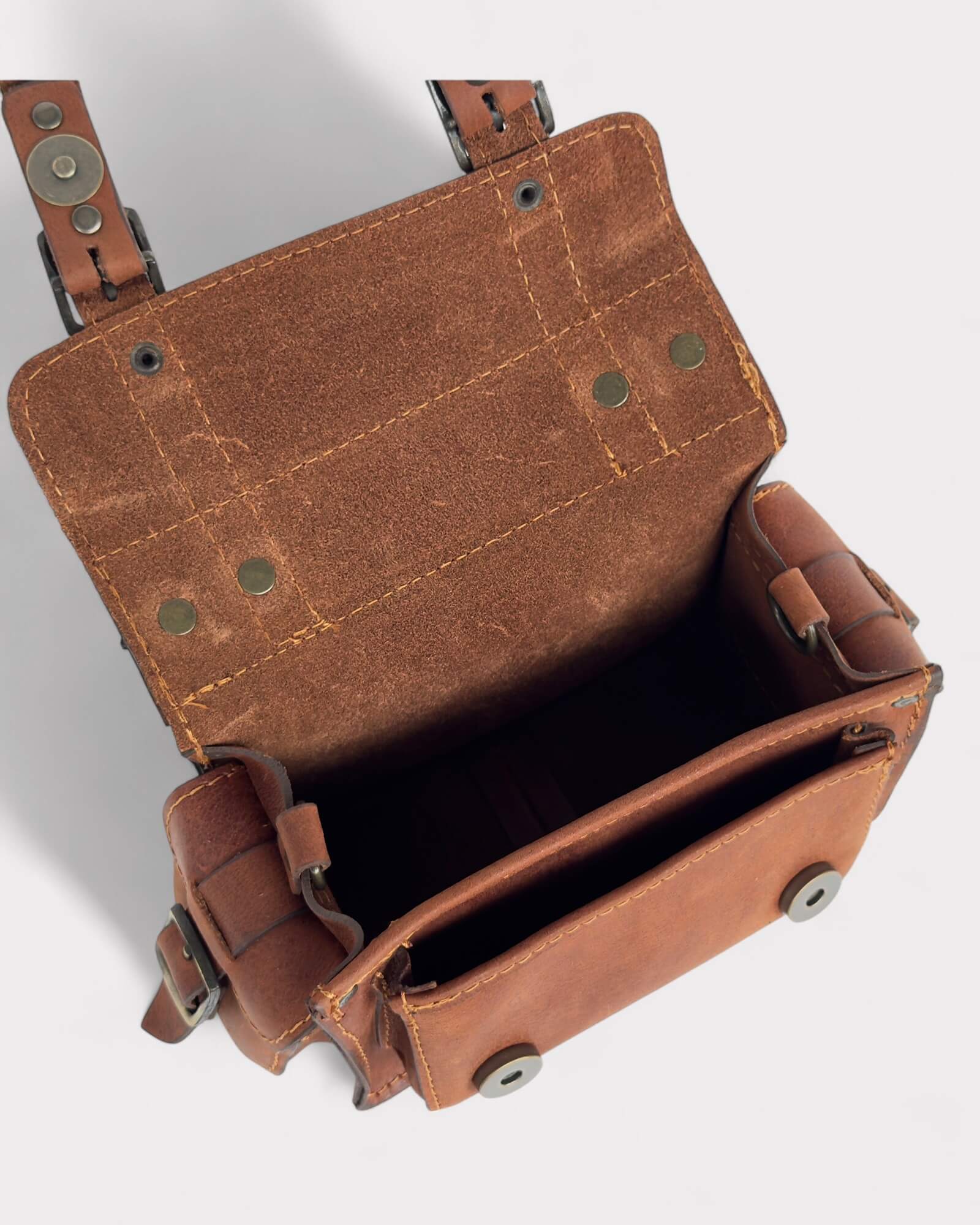 interior capacity brown crossbody satchel
