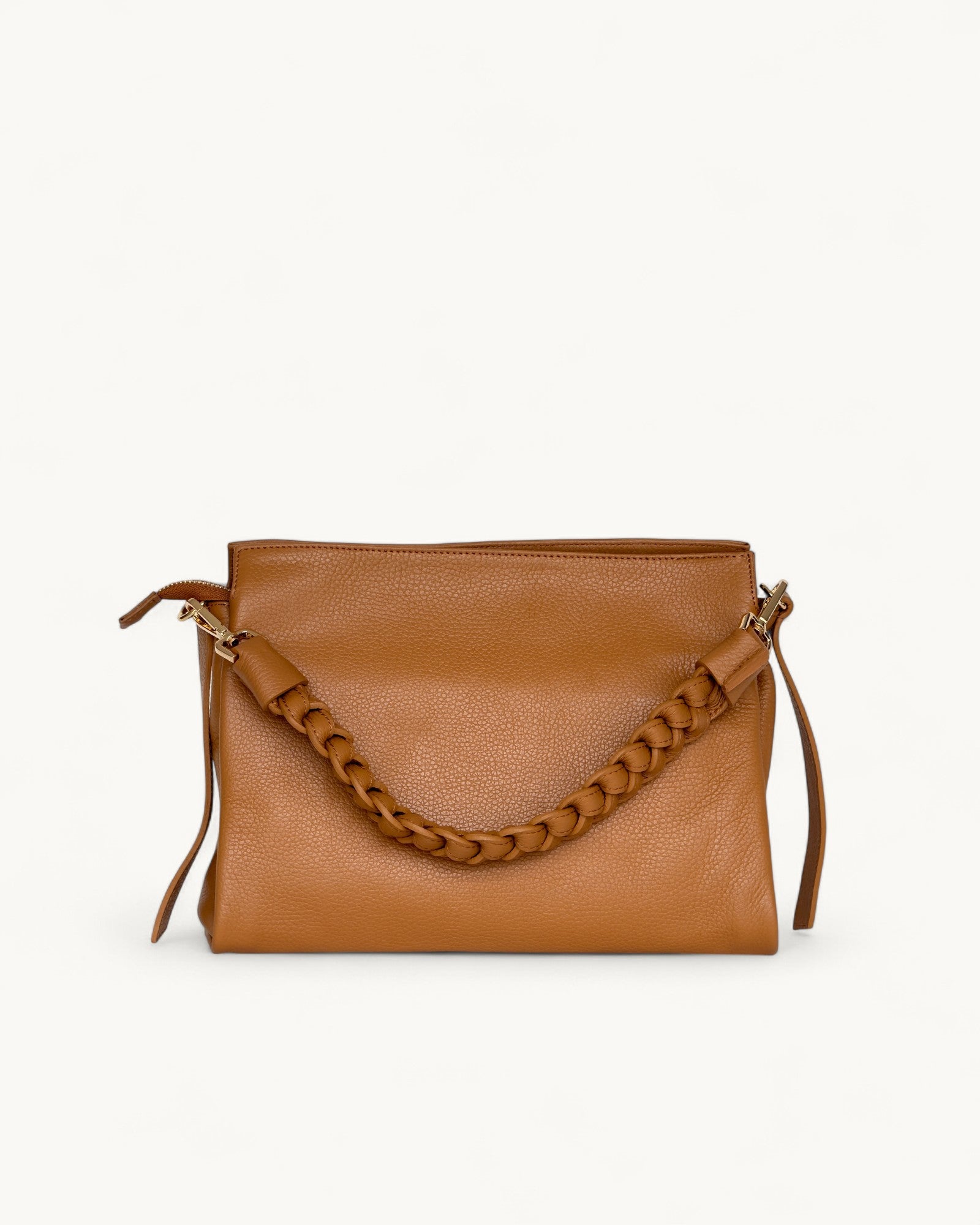 Tan leather handbag with braided handle on a white background