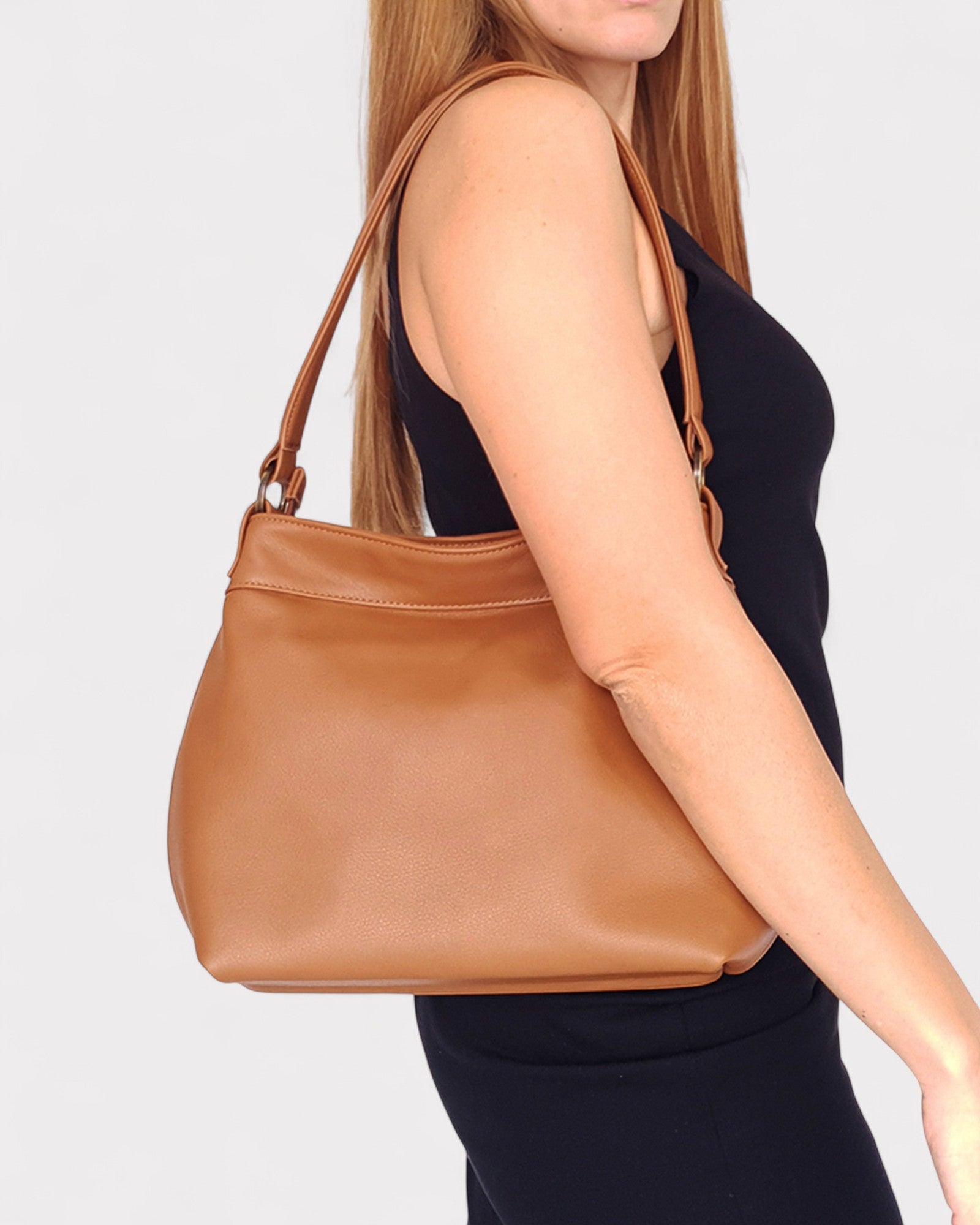 tan small hobo bag on model