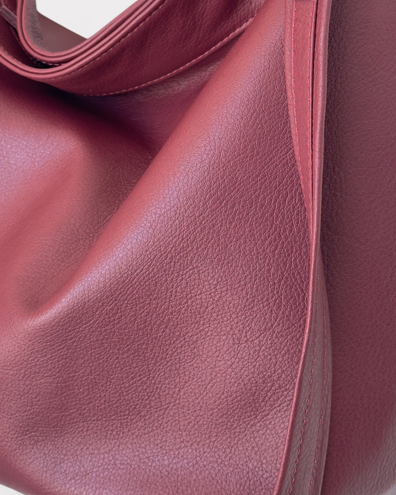 zoom in photo of red medium hobo bag