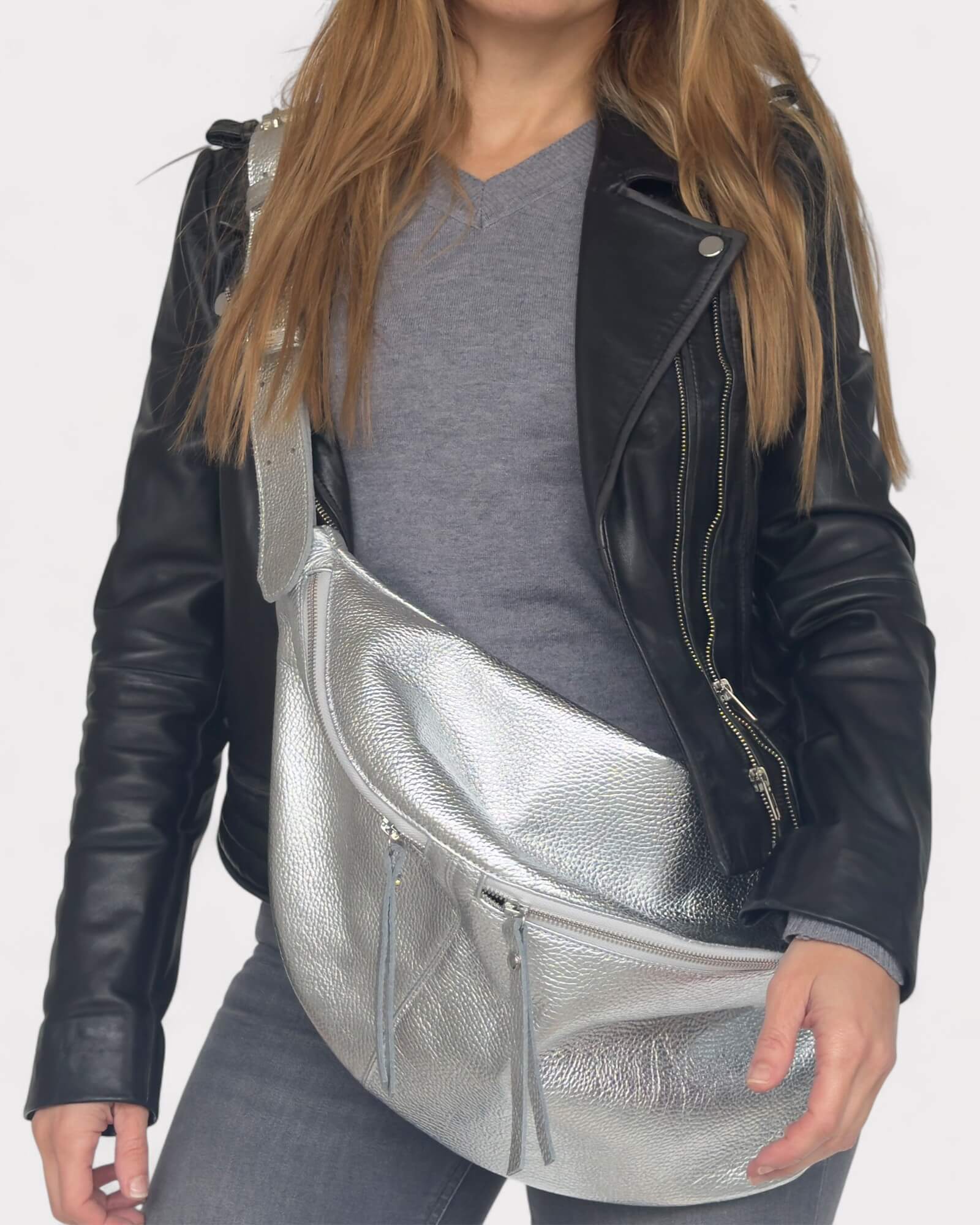 Person wearing a silver metallic bag.
