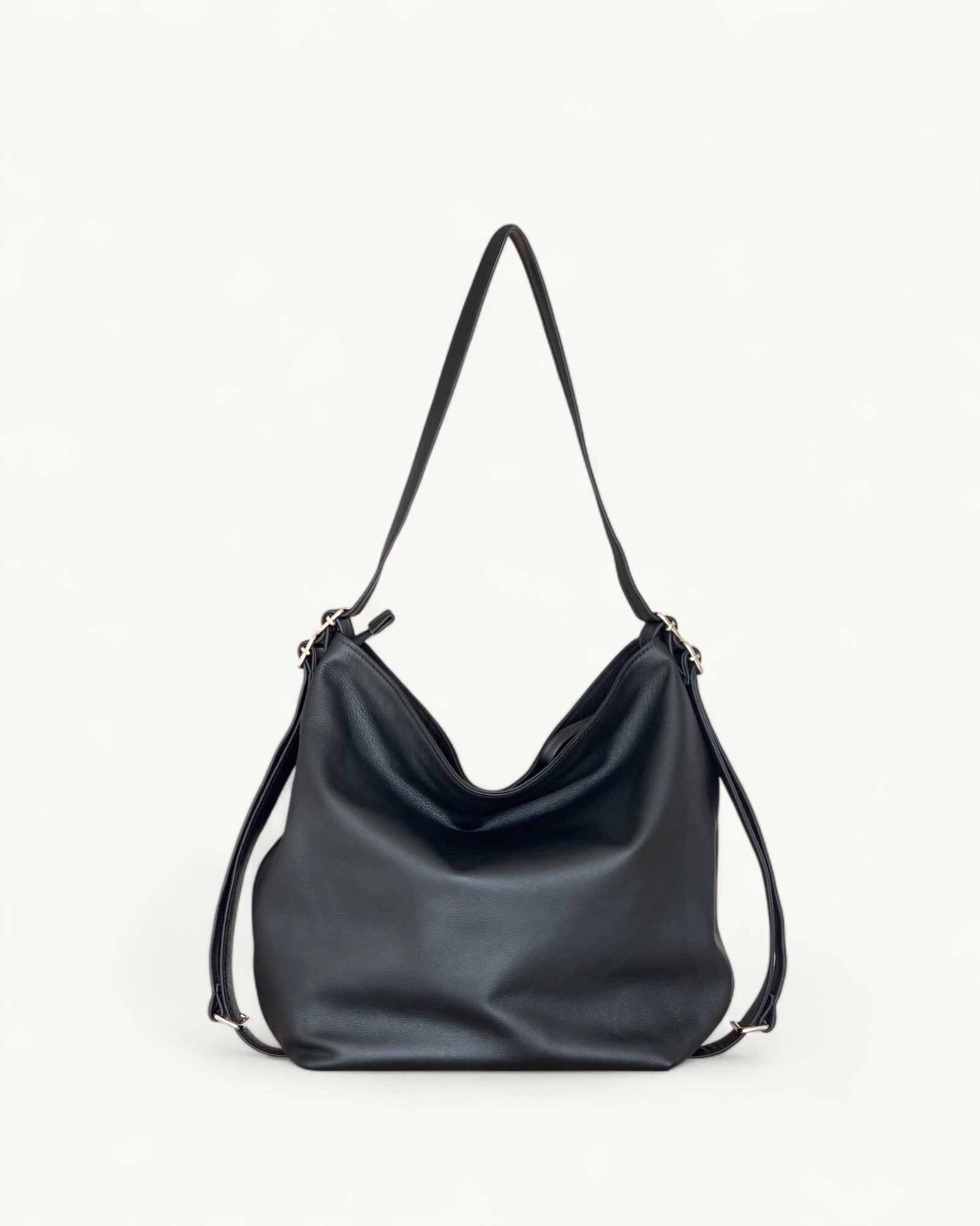 Black shoulder bag on a light gray background