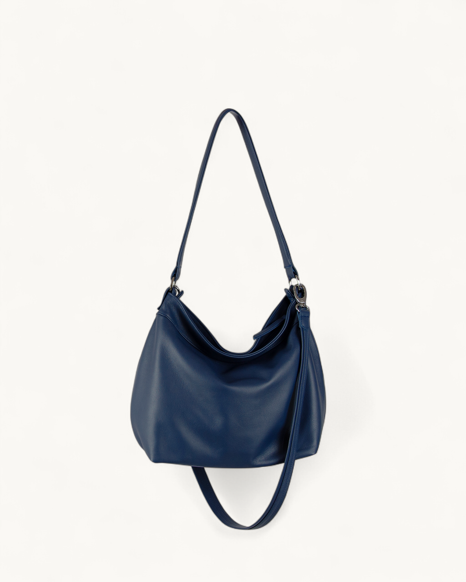 Blue handbag with a strap on a white background