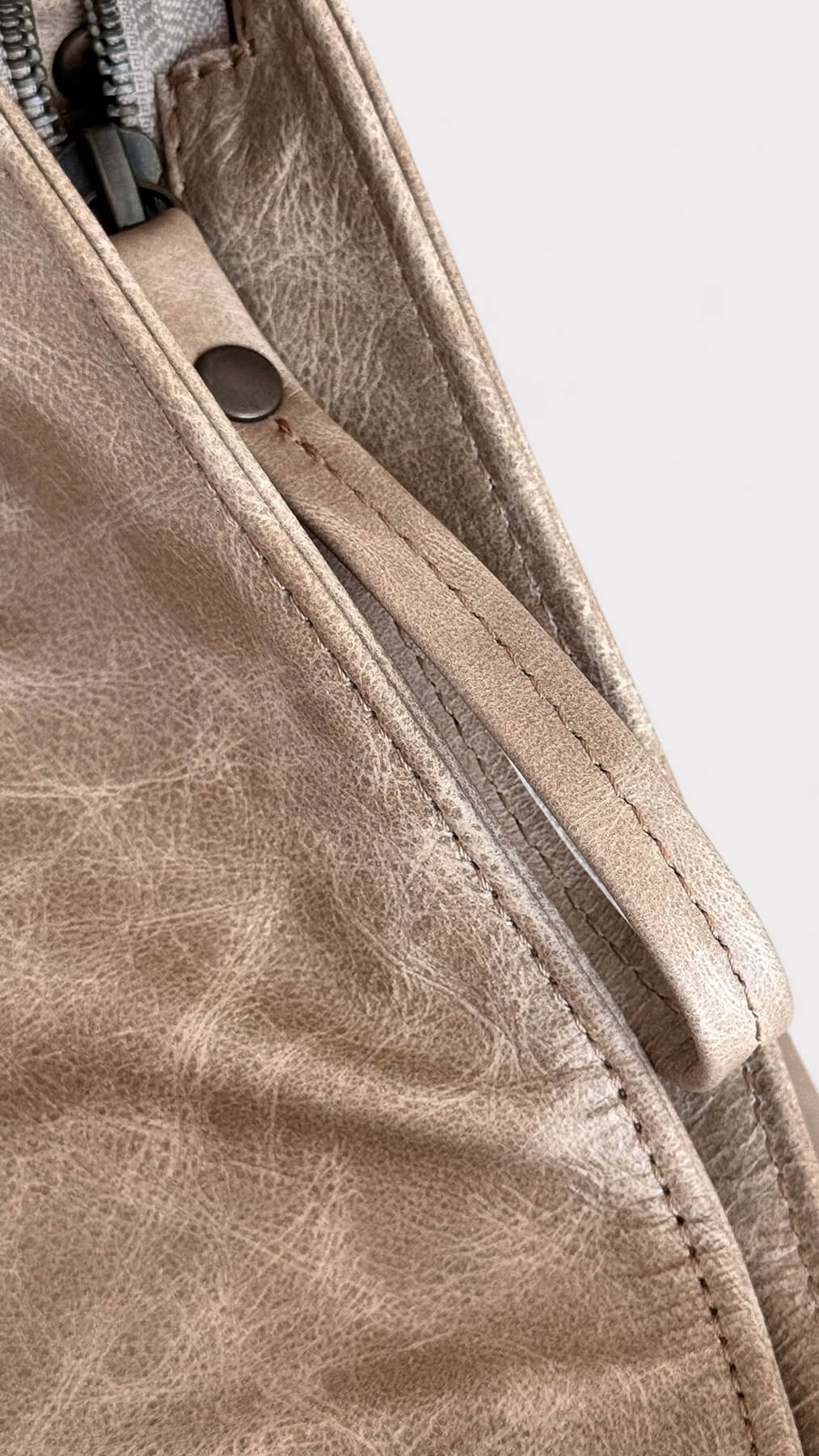 Close-up of a beige bag