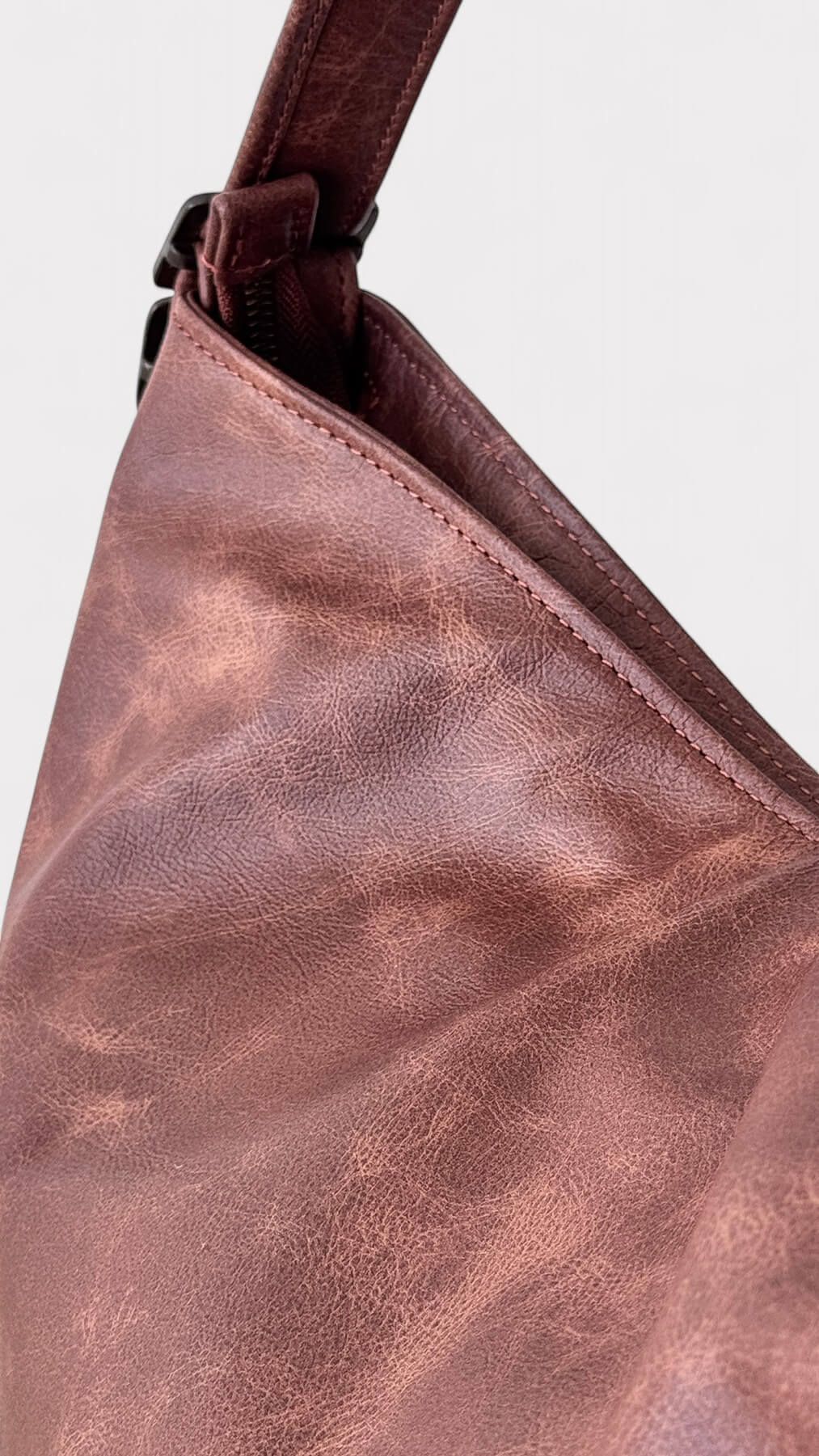 Close-up of a brown leather bag 