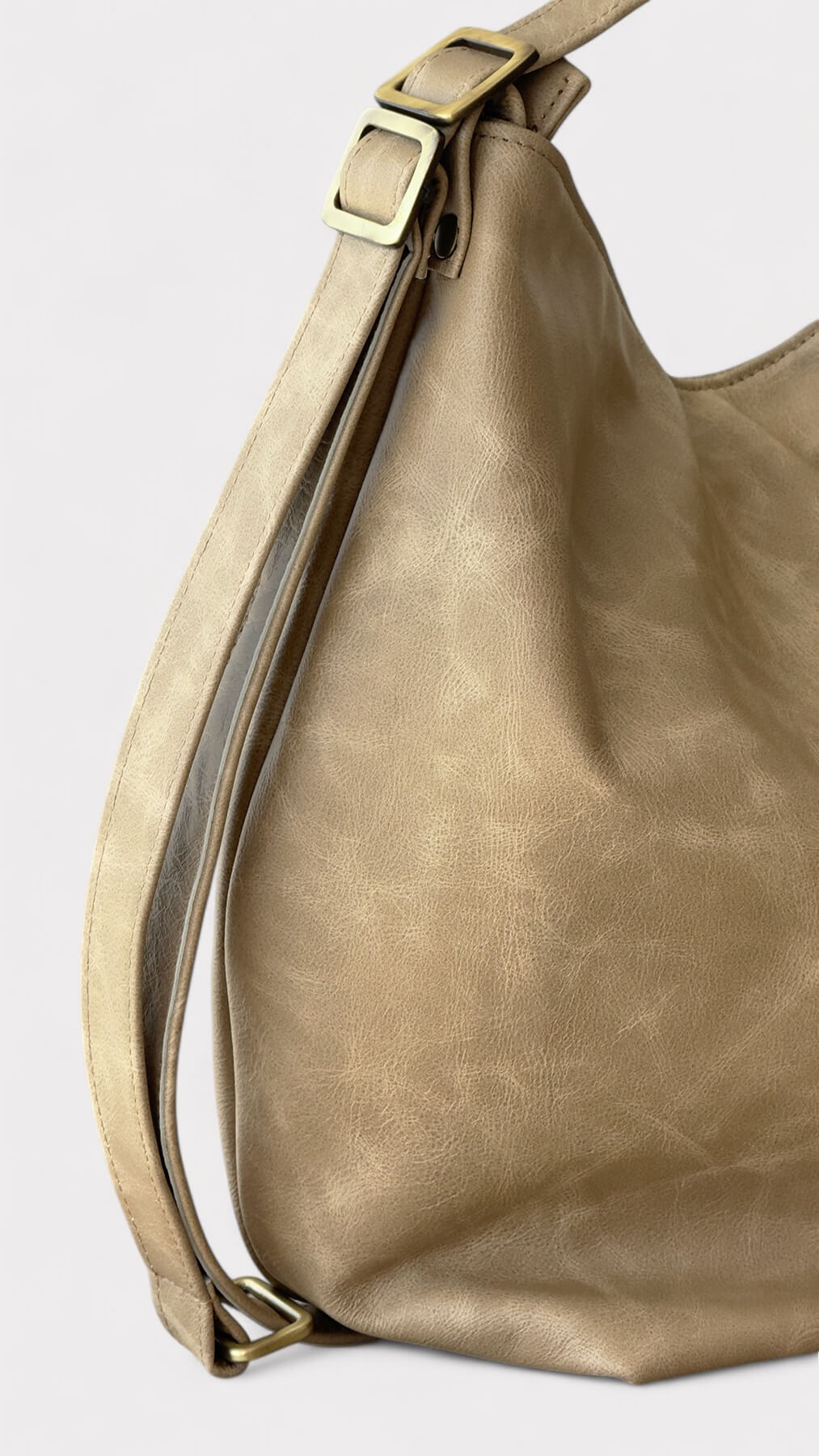 Beige leather handbag details