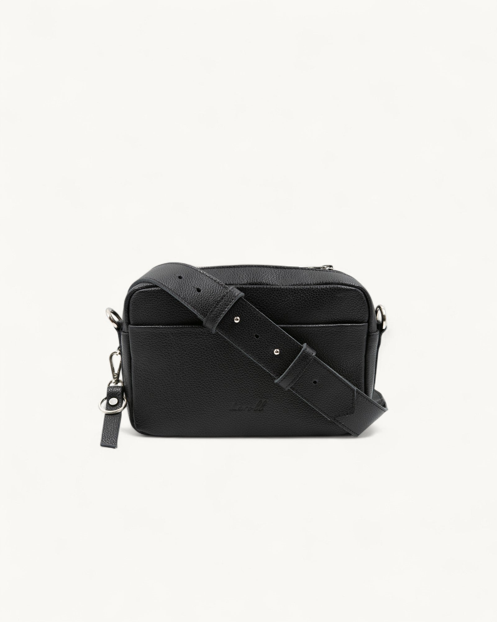 Black leather crossbody bag on a white background