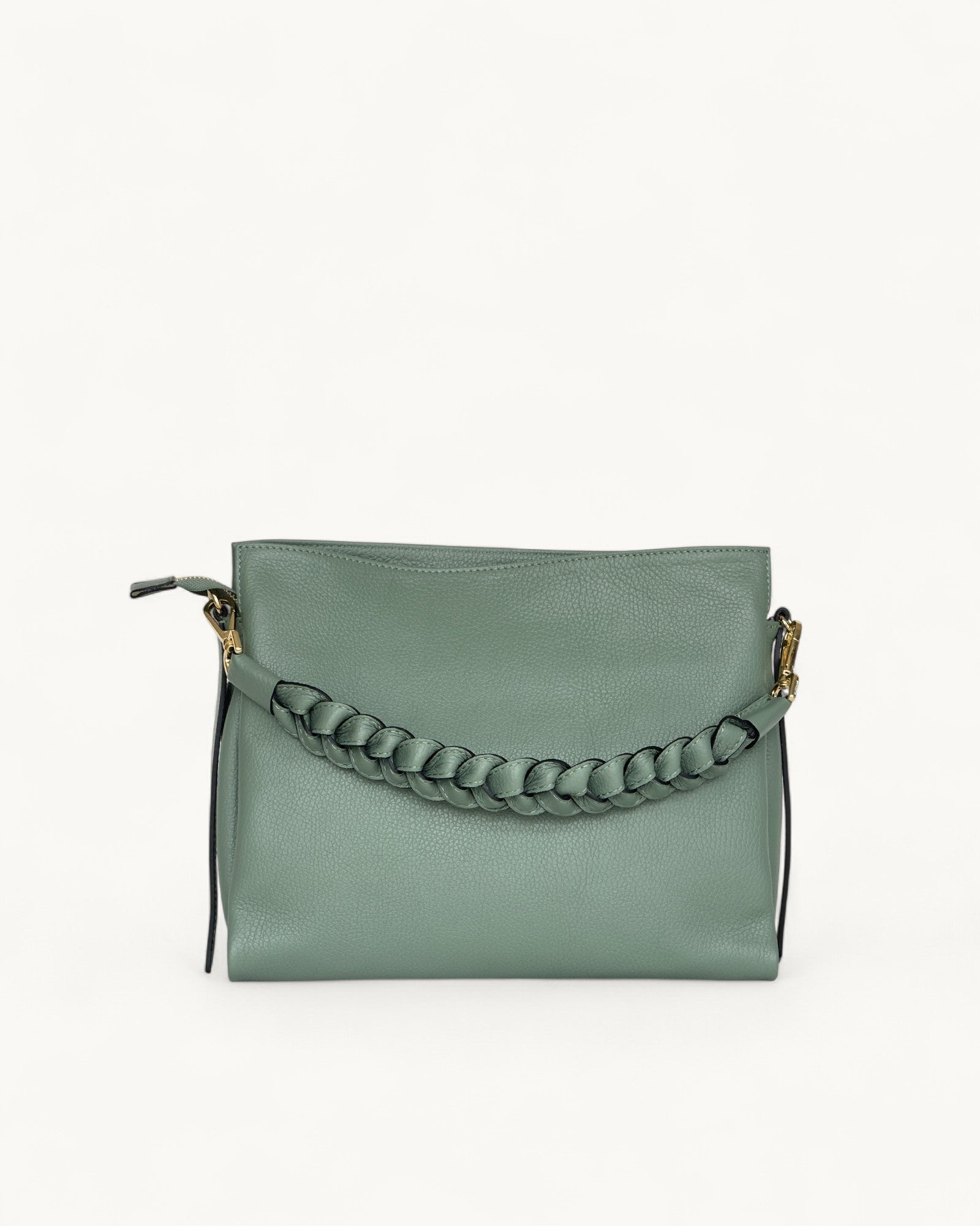 Sage handbag with braided handle on a white background