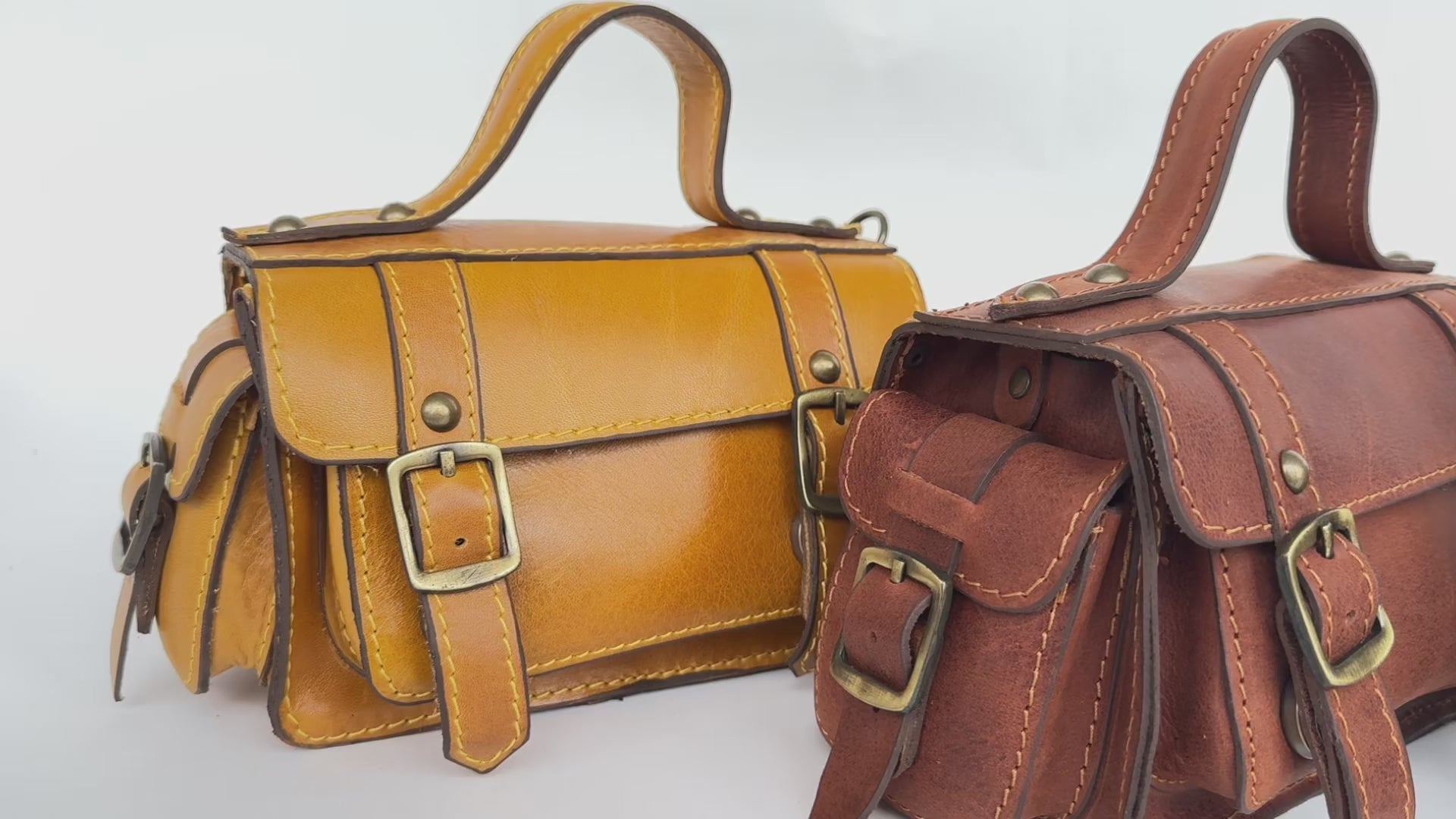 VIDEO OF SMALL LEATHER SATCHEL BAGS WITH EXTERIOR POCKETS