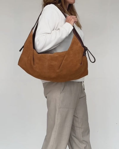 video of tan suede deluna bag
