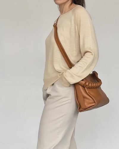video of square braided shoulder bag in tan