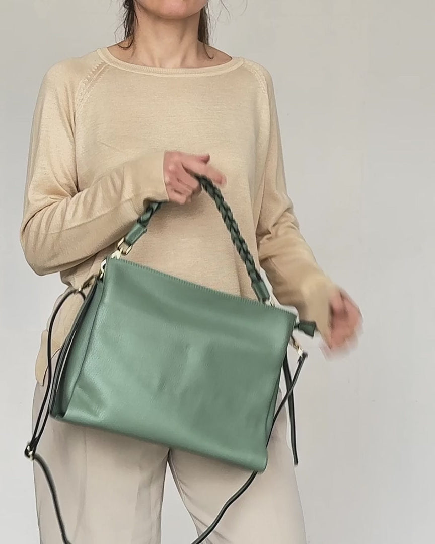 video of square braided shoulder bag in sage