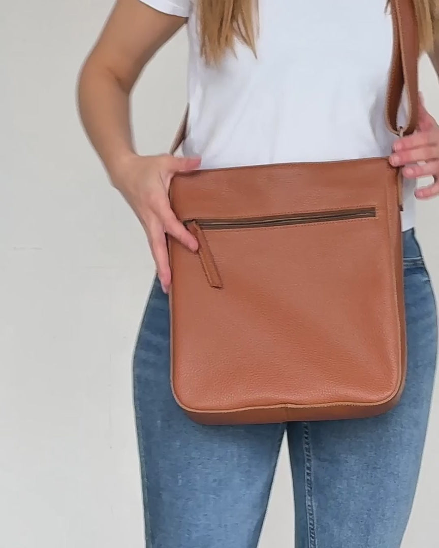 video of tan crossbody stella bag